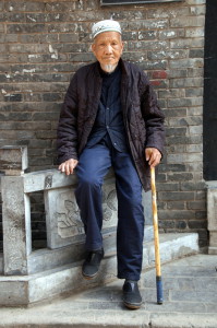 Een vriendelijke moslim in de gezellige moslimwijk van Xi'an